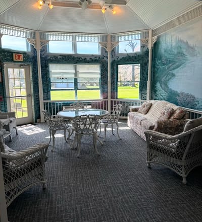 Bright and inviting common area with floral decor