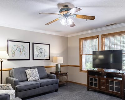 Cozy common area with a sofa and TV