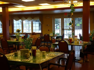 Dining area with tables set for a meal