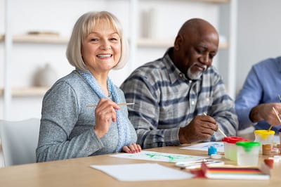 Residents participating in an art activity together