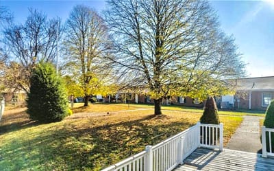 Scenic view of outdoor space with trees and pathway