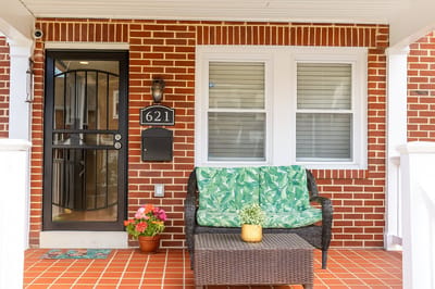 Entrance area with seating and potted plants