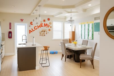 Bright and inviting common area with dining table
