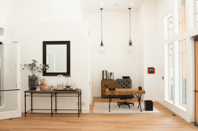 Bright interior reception area with desk and refreshments