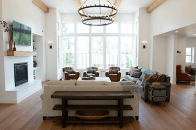 Bright common area with comfortable seating and large windows