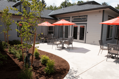 Outdoor patio with tables and umbrellas