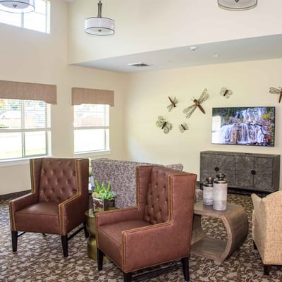 Cozy common area with seating and wall decor