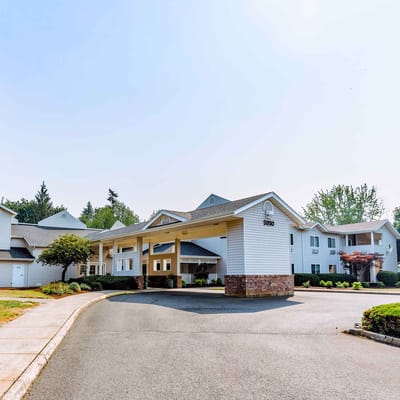Exterior view of the Wiley Creek Memory Care facility entrance