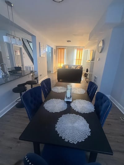 Interior view of a dining area with a table and chairs