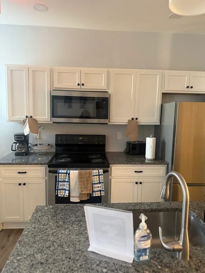 Bright kitchen area with modern appliances