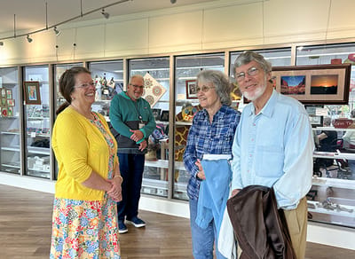 Residents and staff interacting in a cheerful common area
