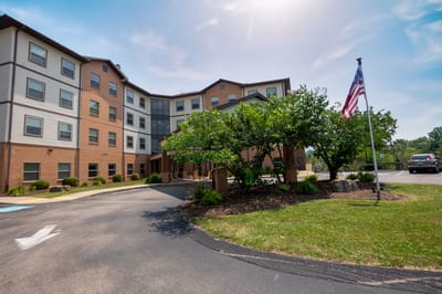 Exterior view of William Penn Senior Suites with landscaping