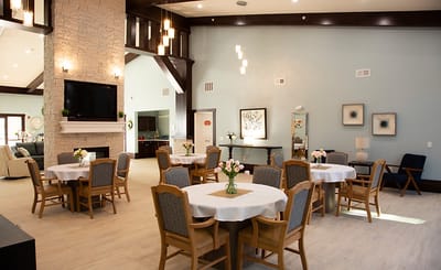 Bright and spacious dining area with tables and chairs