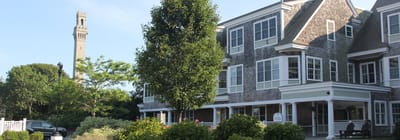 Exterior view of assisted living facility with gardens
