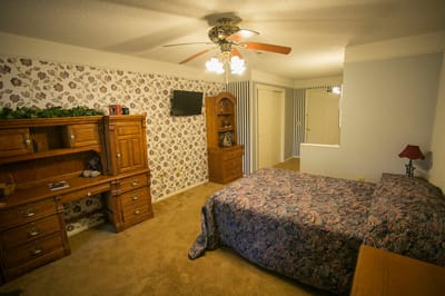 Cozy private bedroom with floral decor