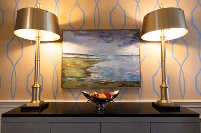 Decorative interior with lamps and a fruit bowl