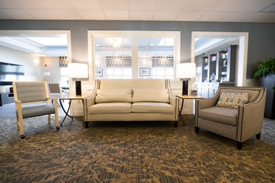 Cozy lounge area with seating and lighting