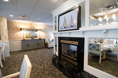 Bright common area with a fireplace and seating