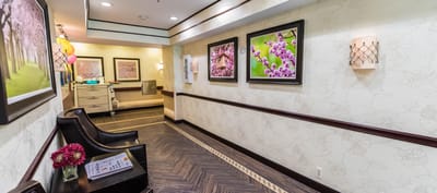 Interior hallway with artwork and seating