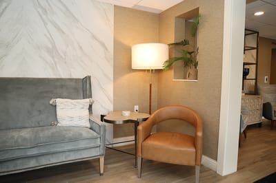 Cozy interior seating area with lamp and decor