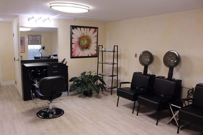 Interior view of a salon area with seating