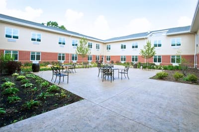 Outdoor courtyard with tables and chairs