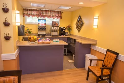 Interior view of a facility café area with seating