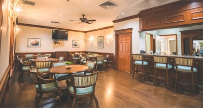 Interior dining area with tables and chairs