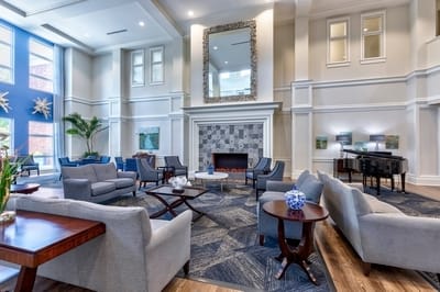 Interior common area with seating and piano