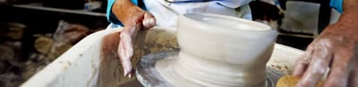 A resident engaged in pottery making activity