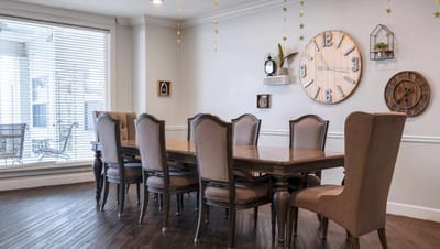 Bright dining room with wooden table and chairs