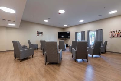 Common area with seating in a bright interior space