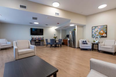 Bright common area with seating and decor