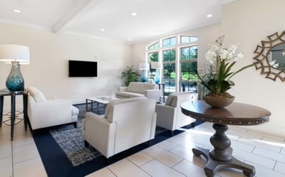 Bright common area with seating and decor