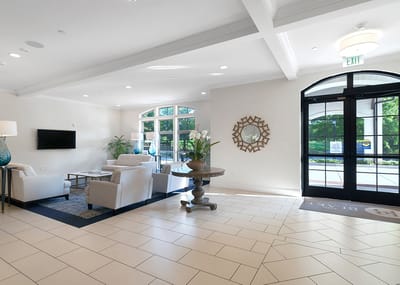Bright lobby area with seating and natural light