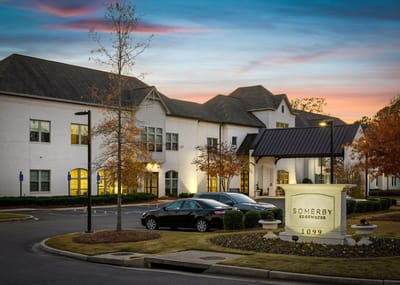 Exterior view of Somerby Edgewater with signage
