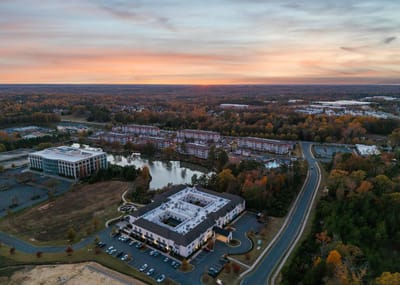 Aerial view of Somerby Edgewater campus at sunset
