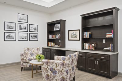 Comfortable interior seating area with bookshelves