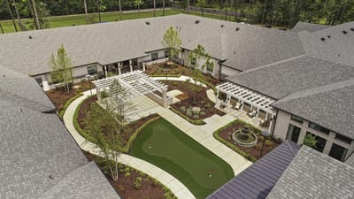 Aerial view of a landscaped courtyard with walking paths