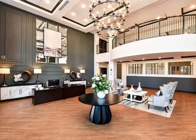 Bright and elegant facility lobby with seating and decor