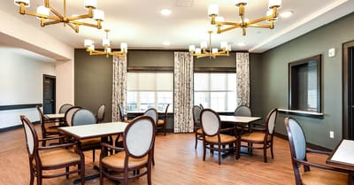 Bright dining area with tables and chairs