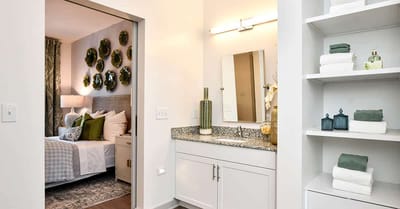 Interior view of a stylish resident room and bathroom