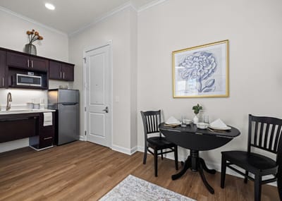 Cozy dining area in a resident room with a small table