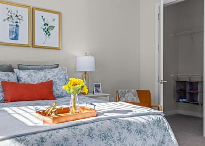 Well-decorated resident room with flowers on a tray