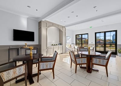 Interior common area with seating and natural light