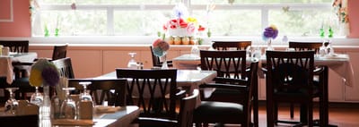 Bright dining room setup with elegant table settings