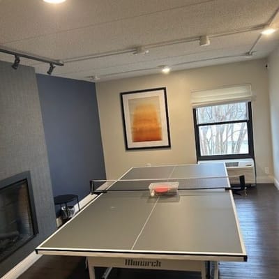 Table tennis setup in a recreational room
