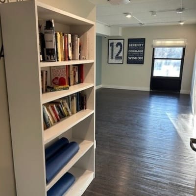 Interior view of a common area with bookshelves