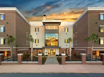 Exterior view of the Bishop Gadsden facility at sunset