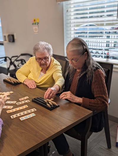 Residents engaging in a game together